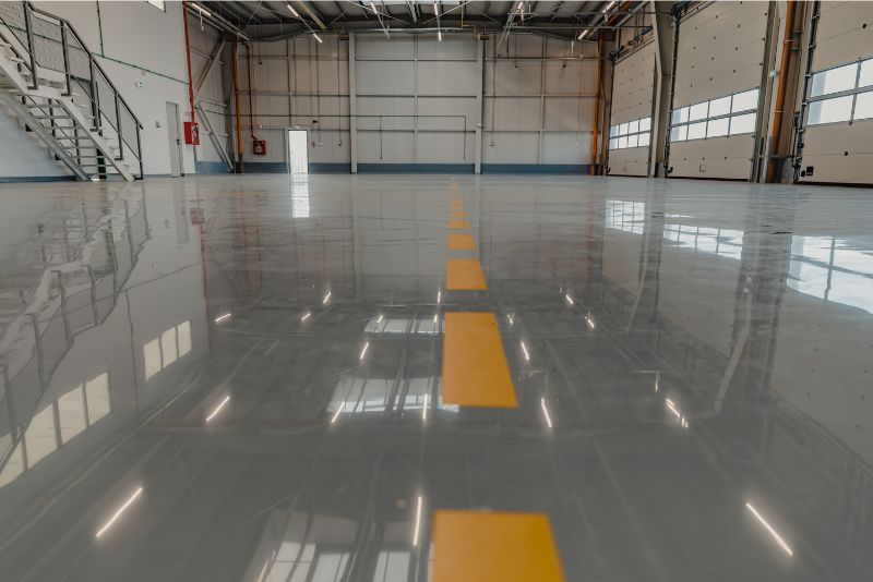 A showroom that has been renovated with a fresh epoxy floor