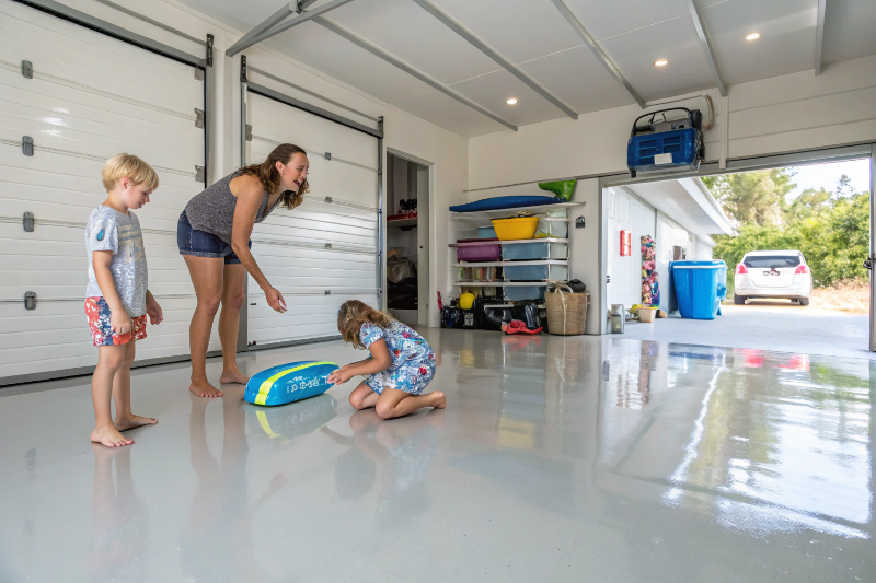 Gold Coast family enjoying converted garage space with professional epoxy flooring installation